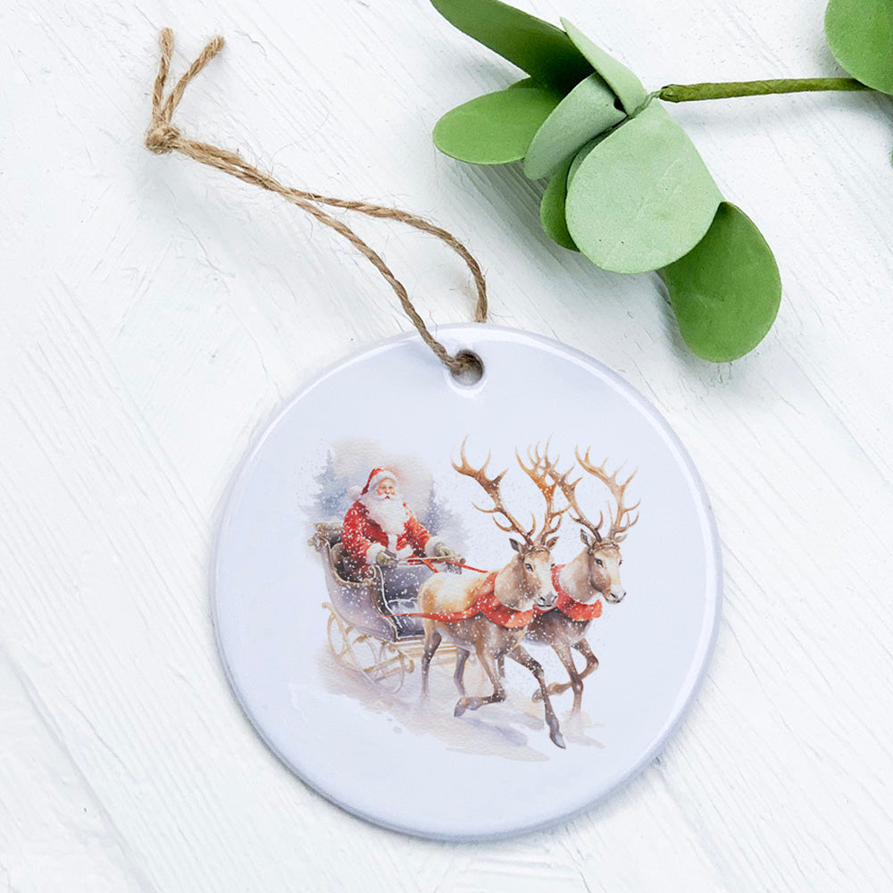 A beautifully crafted porcelain ornament featuring Santa and a reindeer sleigh, showcasing vibrant colors and intricate details.