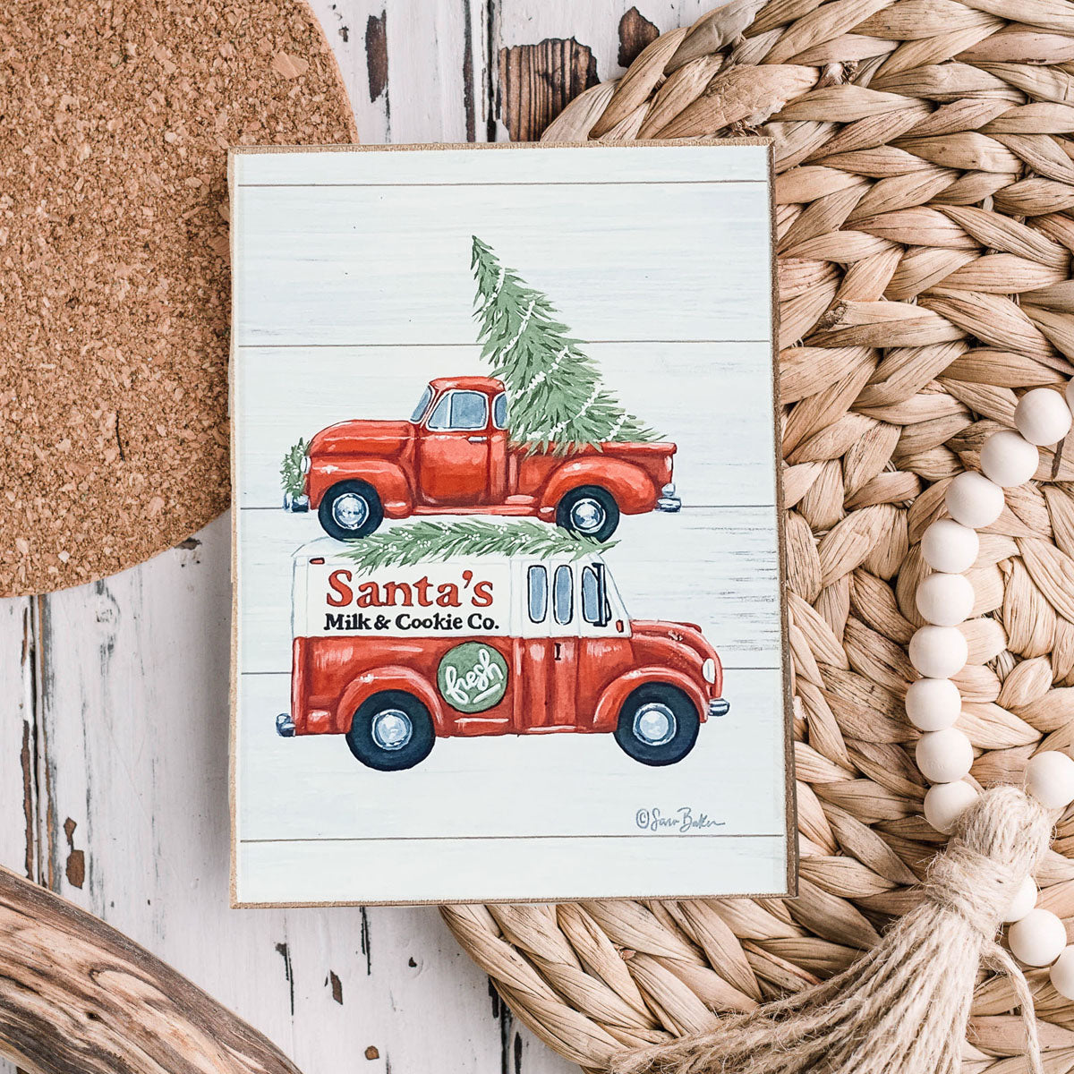 A charming wooden sign that reads 'Santa's Milk & Cookies', perfect for Christmas decor, featuring a rustic design and durable craftsmanship.