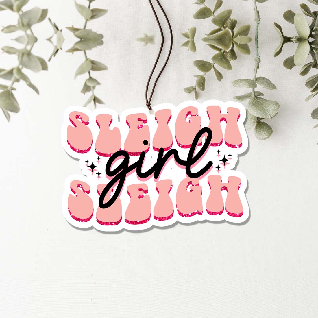 Sleigh Girl Freshie hanging air freshener with festive design and vibrant colors, perfect for holiday decor.