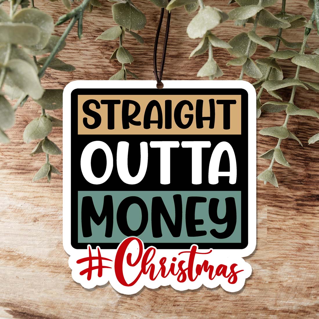 Straight Outta $ Freshie hanging air freshener in a stylish design, showcasing its vibrant colors and appealing scent options.