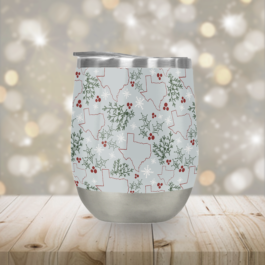 Texas Christmas Stemless Wine Tumbler made of stainless steel with a festive design, perfect for outdoor parties and keeping drinks cool.