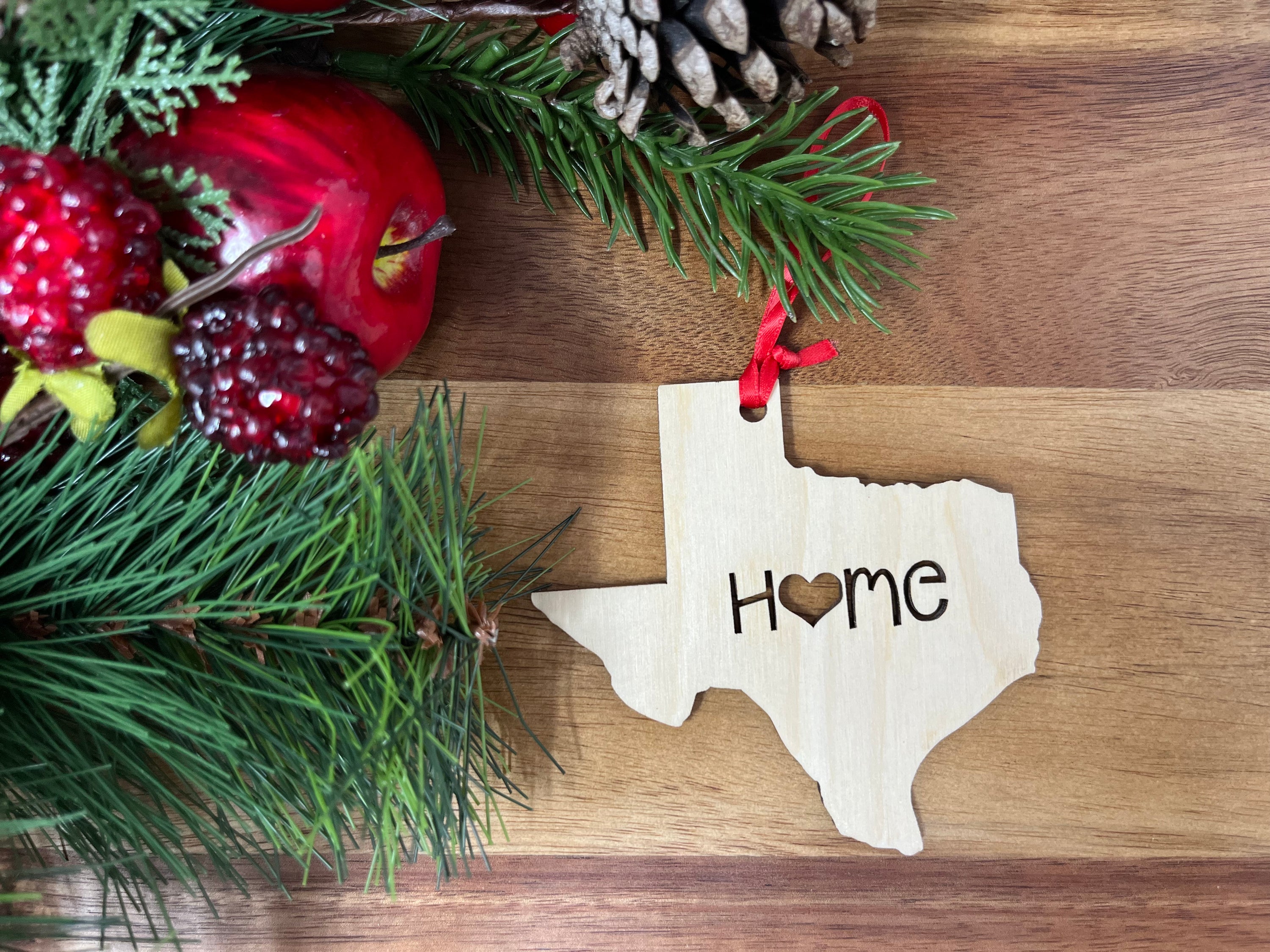 Texas State Wood Christmas Ornament made from Baltic Birch wood, featuring an outline of Texas with a heart design.