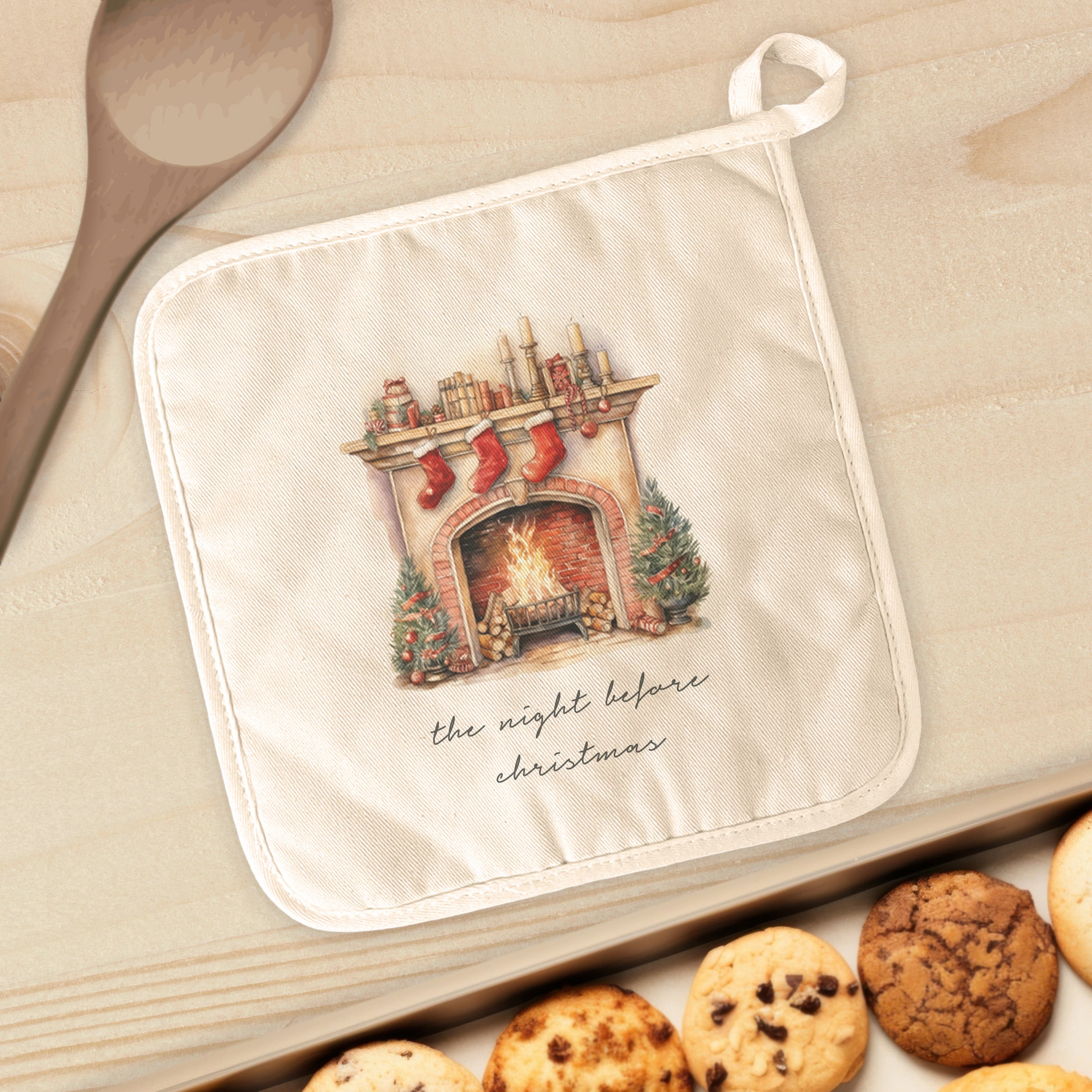 The Night Before Christmas cotton pot holder featuring festive designs, quilted terry cloth, and a convenient hanging loop.