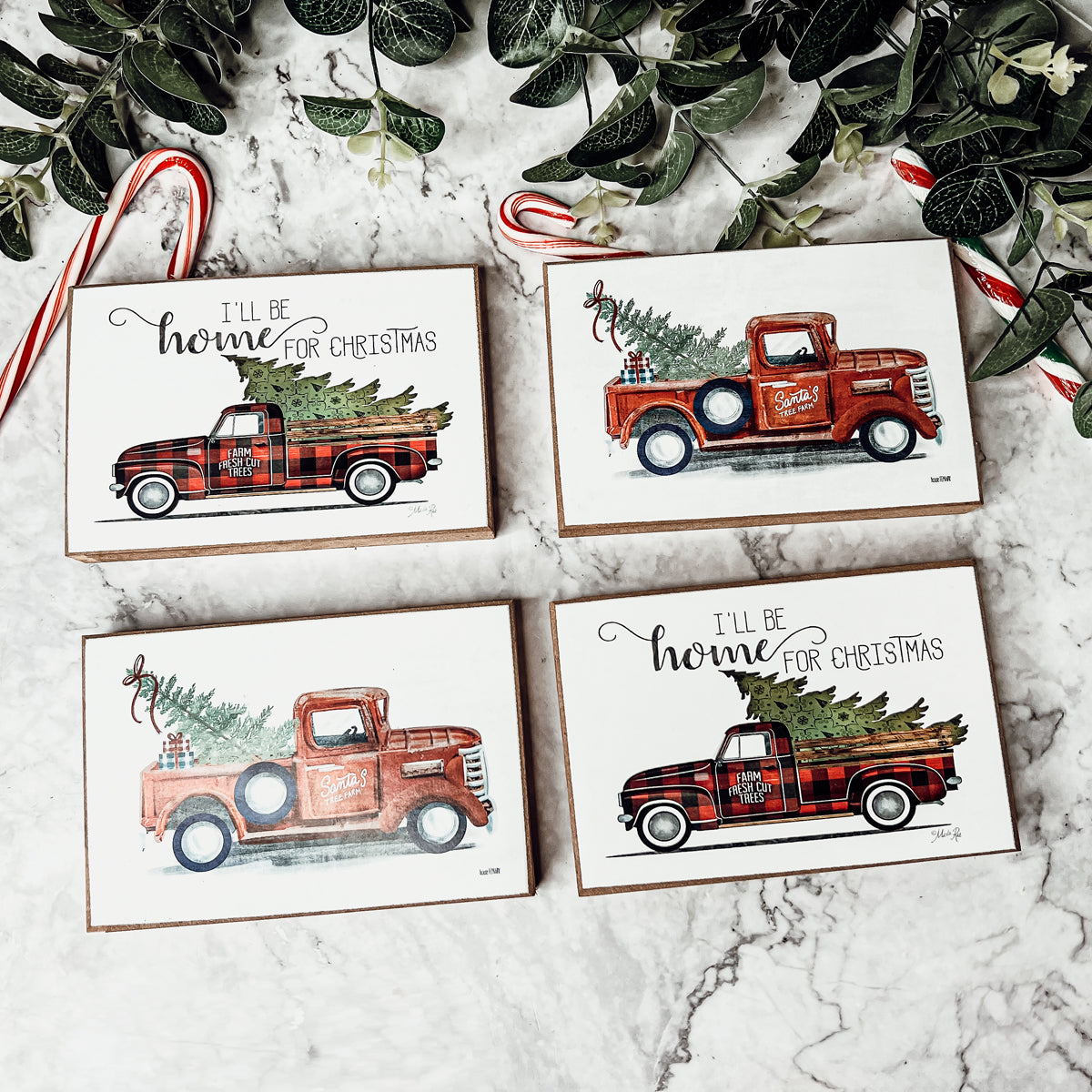 A charming Vintage Red Truck Sign featuring a classic red pickup truck with a Christmas tree, perfect for holiday decor.