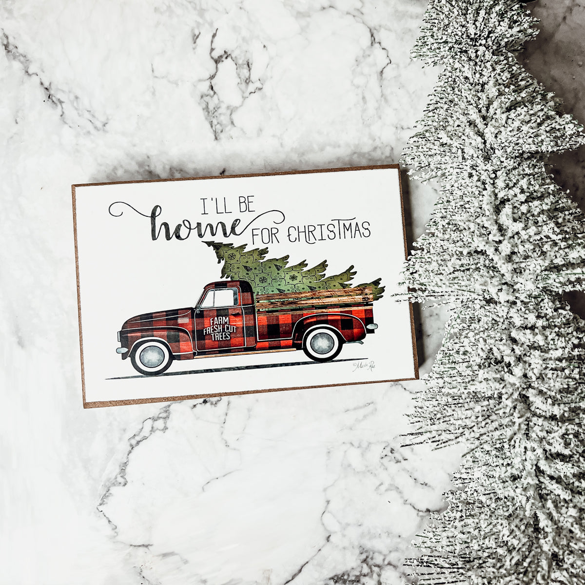 A charming Vintage Red Truck Sign featuring a classic red pickup truck with a Christmas tree, perfect for holiday decor.