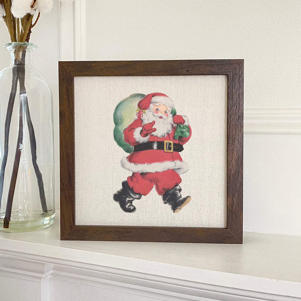 Vintage Santa with Gift Sack framed sign featuring a rustic wood frame and eco-friendly printing.