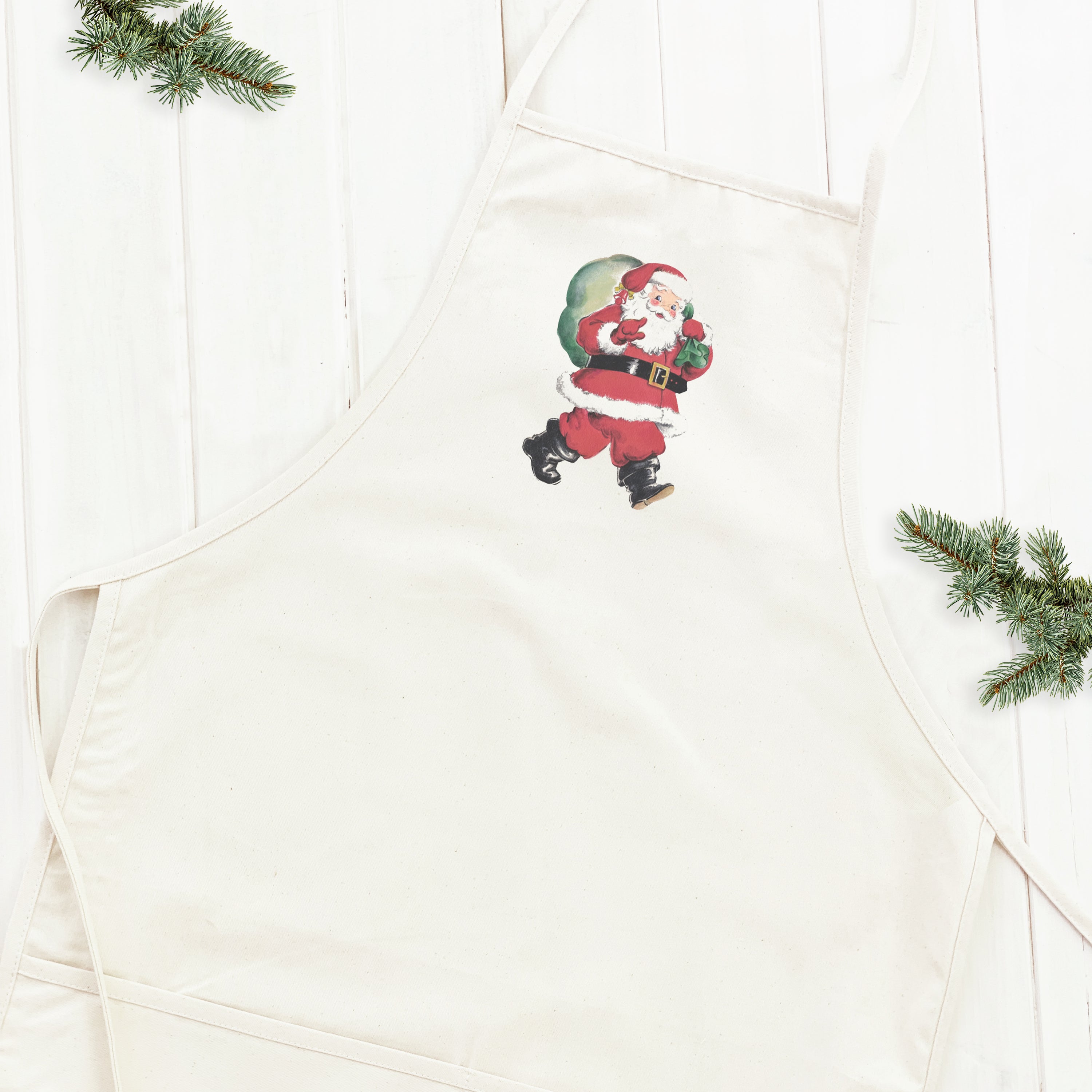 Vintage Santa with Gift Sack women's apron featuring a charming design, adjustable neck strap, and divided front pocket.