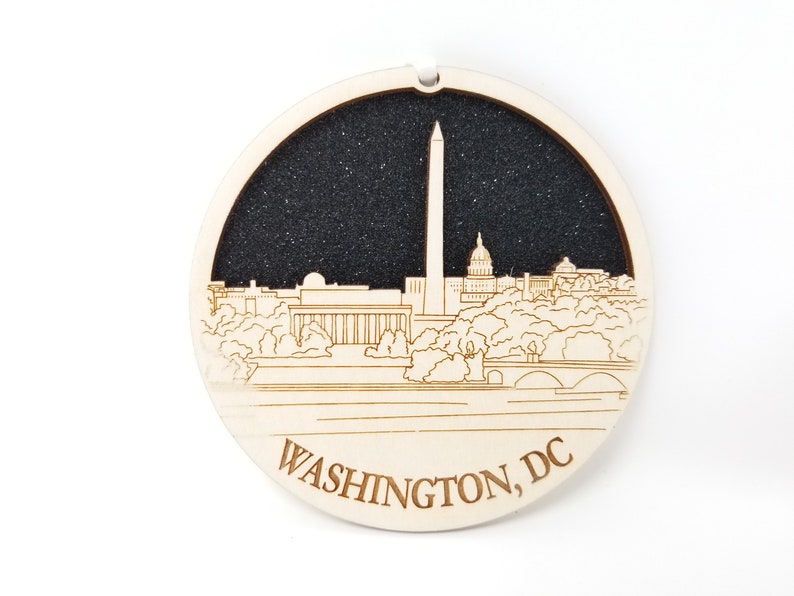 Washington DC skyline ornament made from premium Baltic birch wood, showcasing iconic city landmarks.