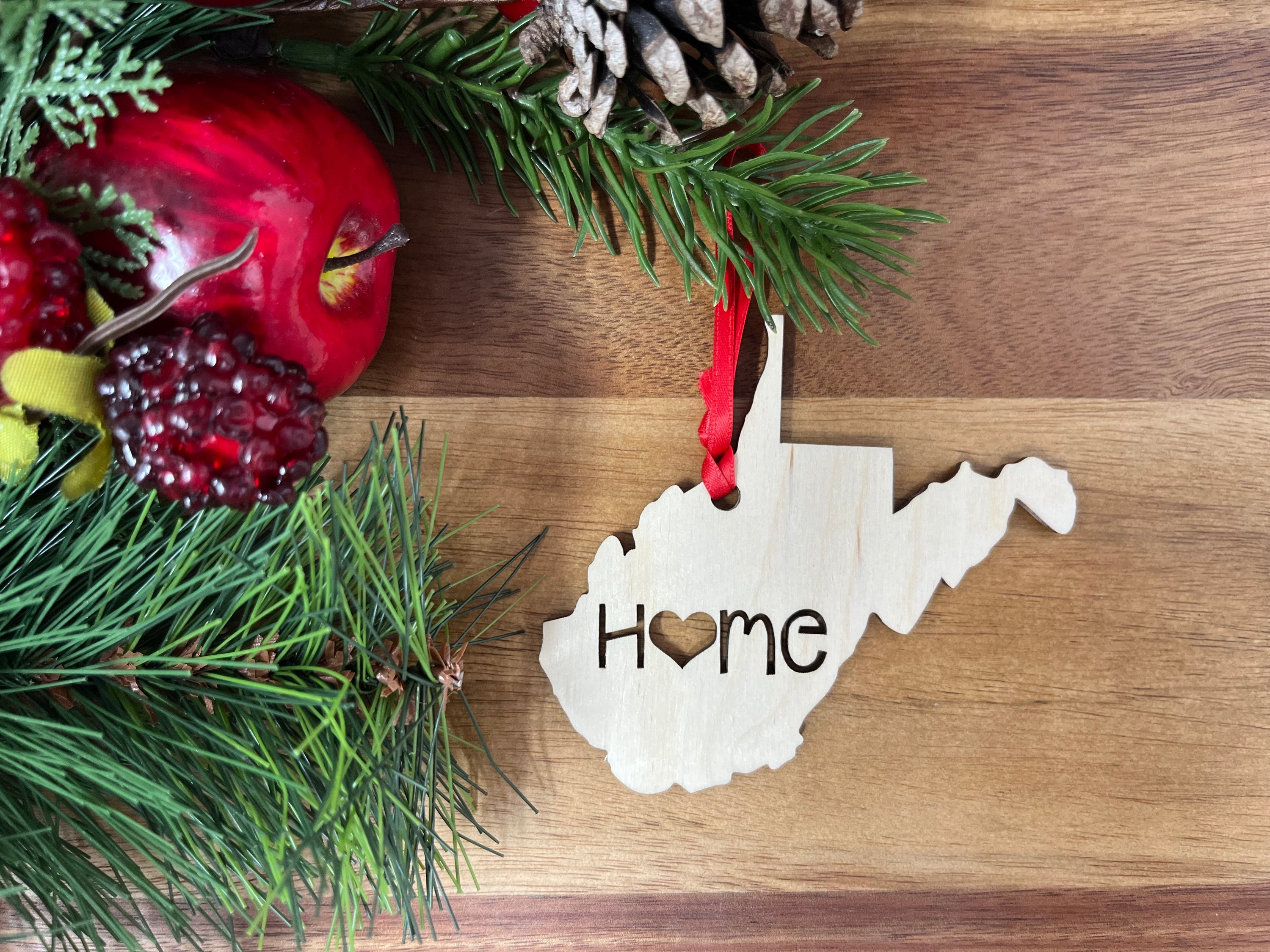 West Virginia State Wood Christmas Ornament featuring 'Home' design, crafted from premium Baltic Birch wood.