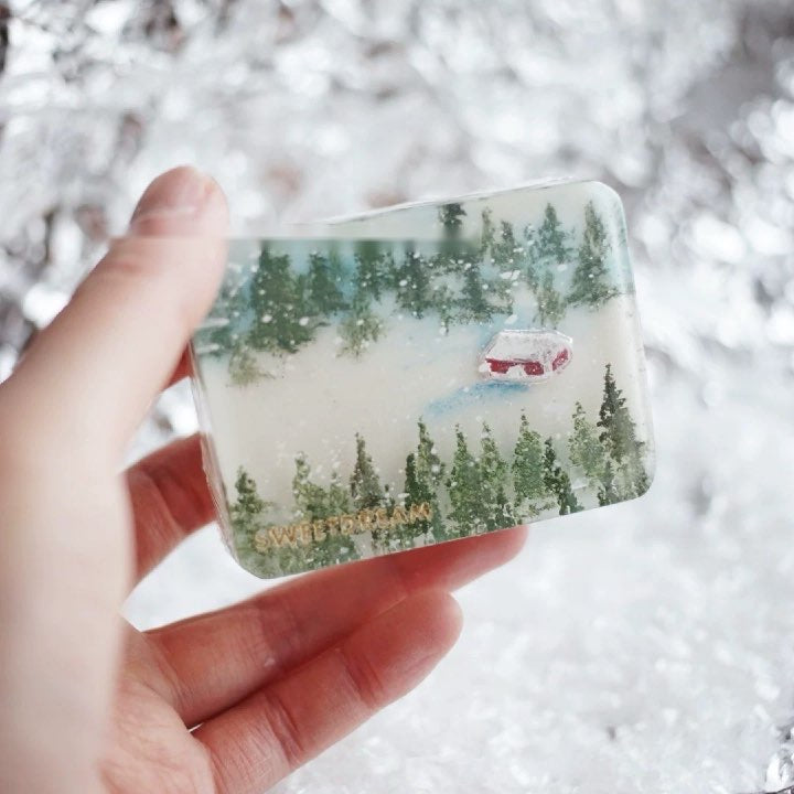 Handmade aromatic soap gift featuring winter forest and alpine cool scents, beautifully packaged for the holiday season.