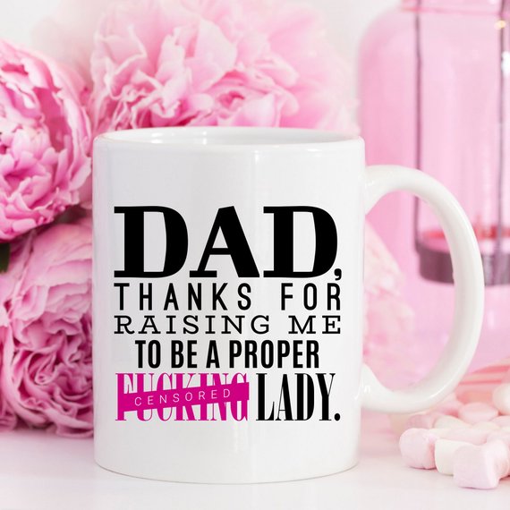 A high-quality white ceramic mug featuring a funny design, perfect for Father's Day gifts for men, showcasing vibrant colors and durable print.