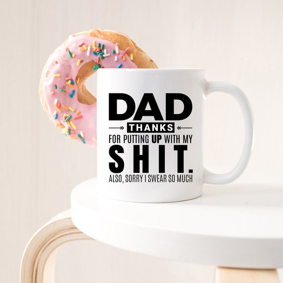 A high-quality white ceramic mug with a funny design, perfect for Father's Day gifts, showcasing vibrant colors and printed on both sides.