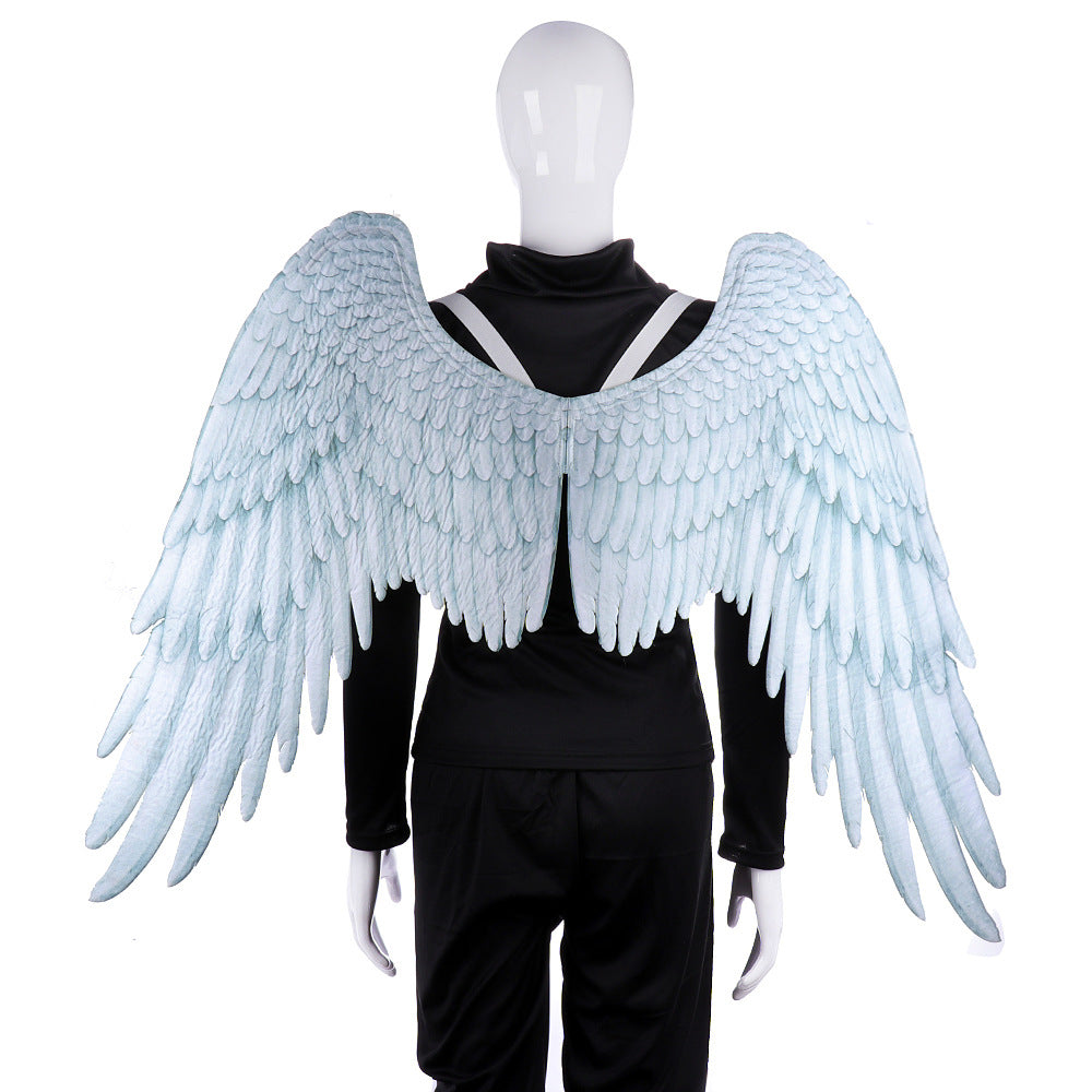 A pair of stunning Halloween Angel Wings designed for kids, featuring a vivid 3D design in white and black non-woven fabric, perfect for cosplay and dress-up parties.