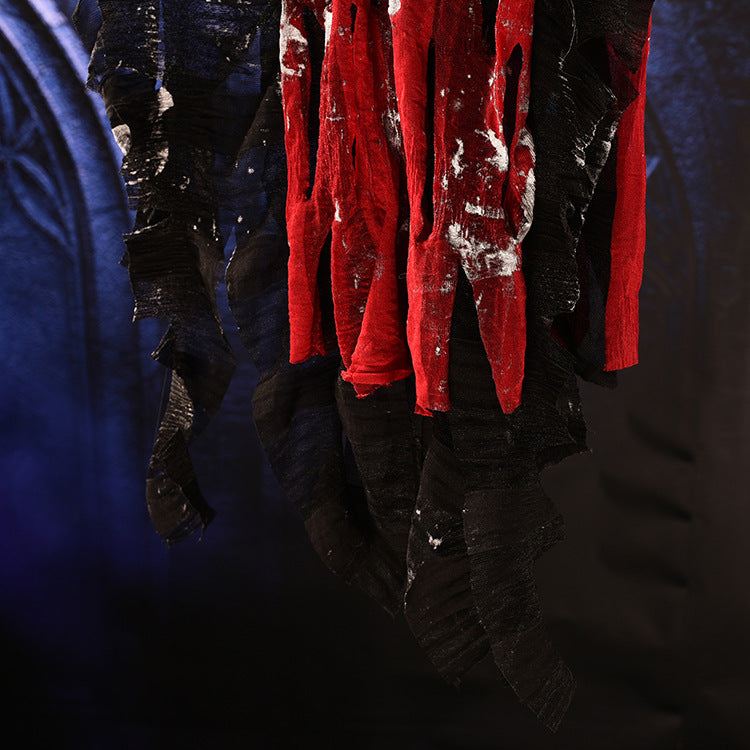 A spooky skeleton hanging ghost prop with a skull and red flashing eyes, designed for Halloween decorations, creating a terrifying atmosphere.