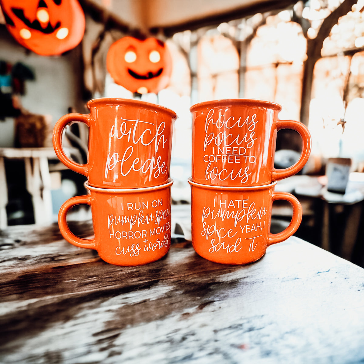 Pumpkin + Horror Mug featuring vibrant orange color and white lettering, perfect for fall and horror movie lovers.