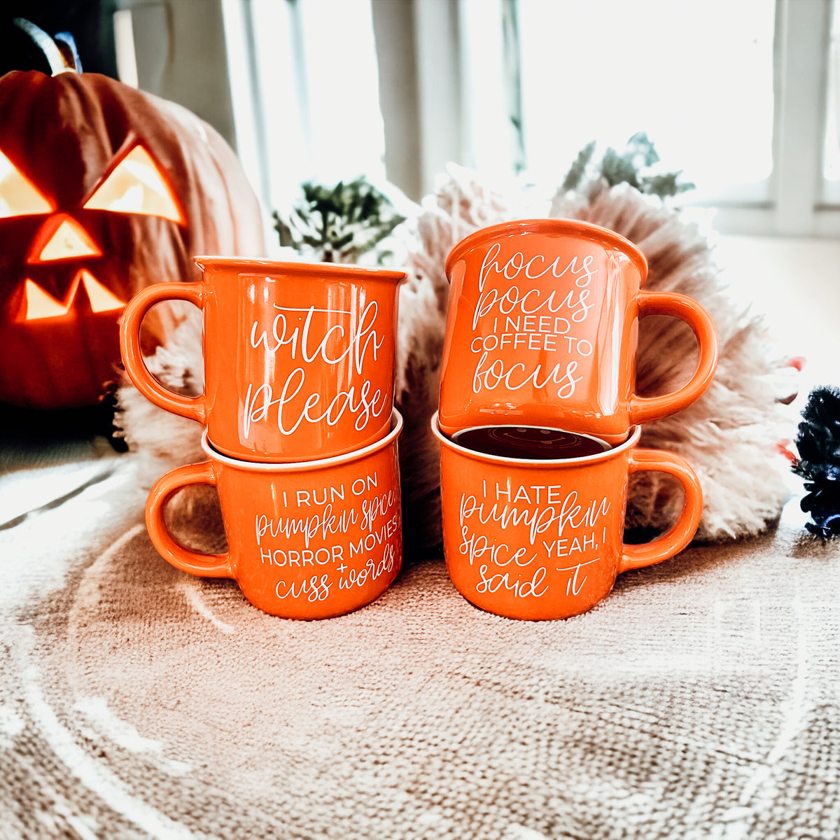 Pumpkin + Horror Mug featuring vibrant orange color and white lettering, perfect for fall and horror movie lovers.