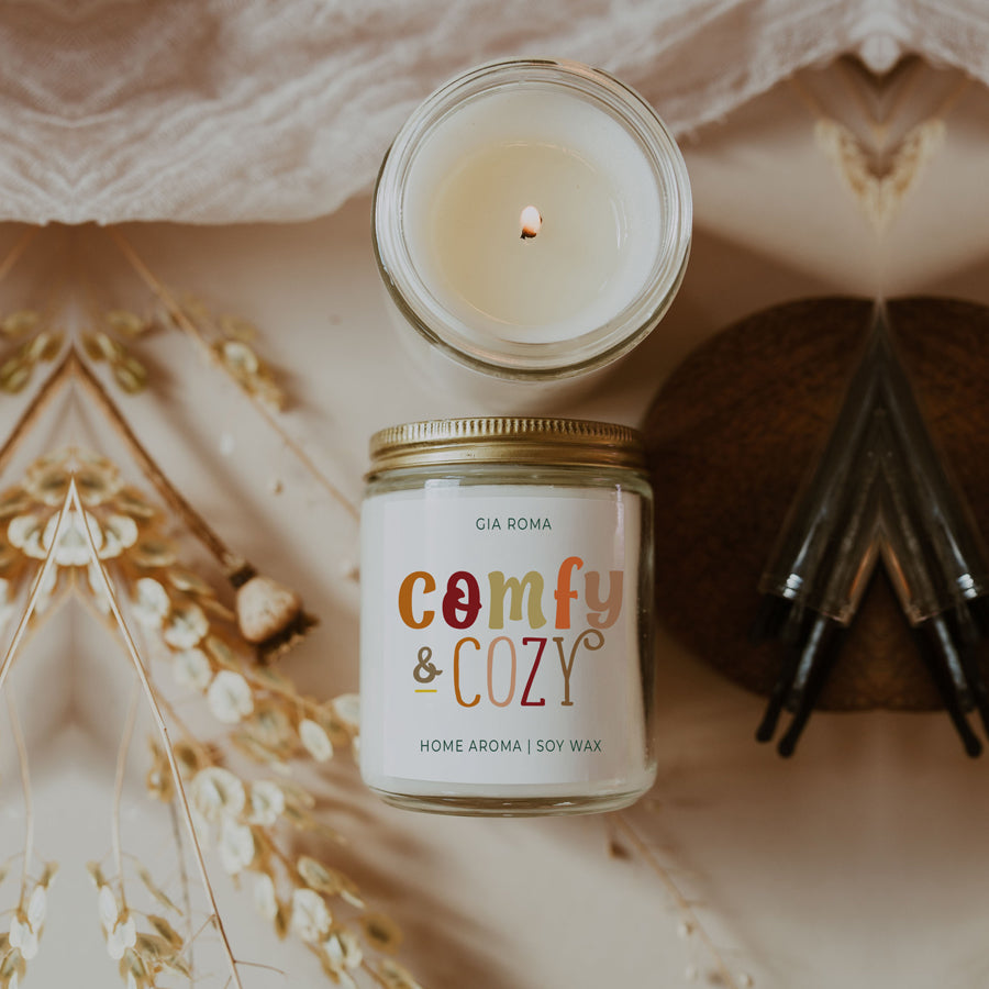 Soy candle labeled "Comfy & Cozy".