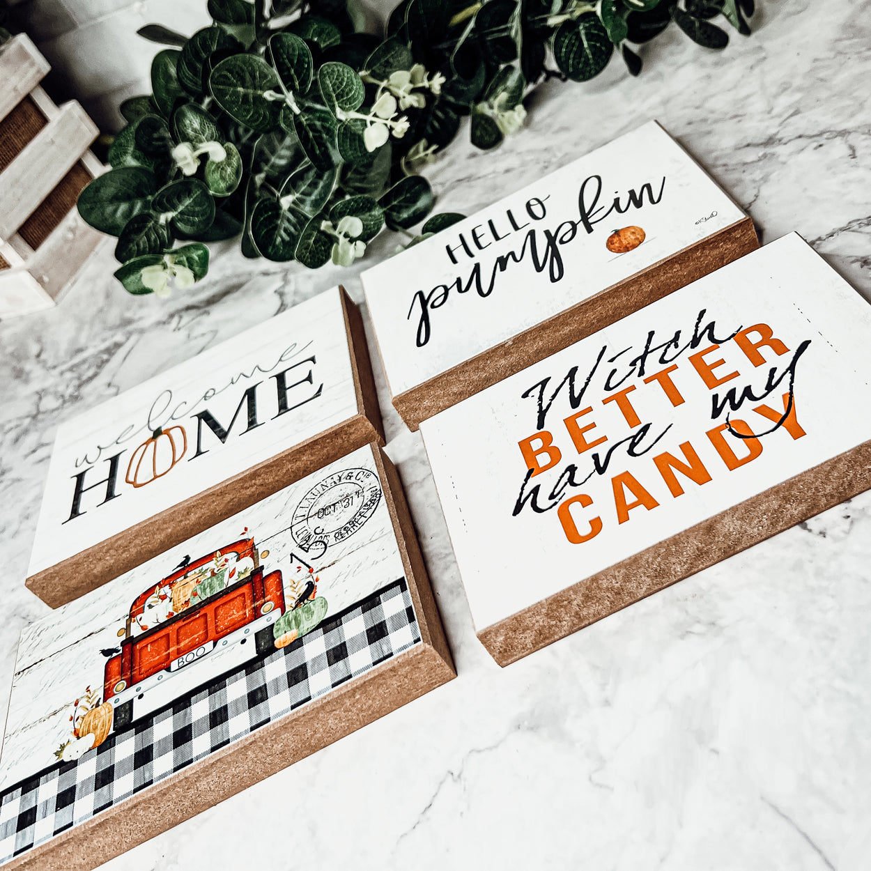 A rustic wooden sign reading 'Witch Better Have My Candy' in black and orange lettering, perfect for Halloween decor.