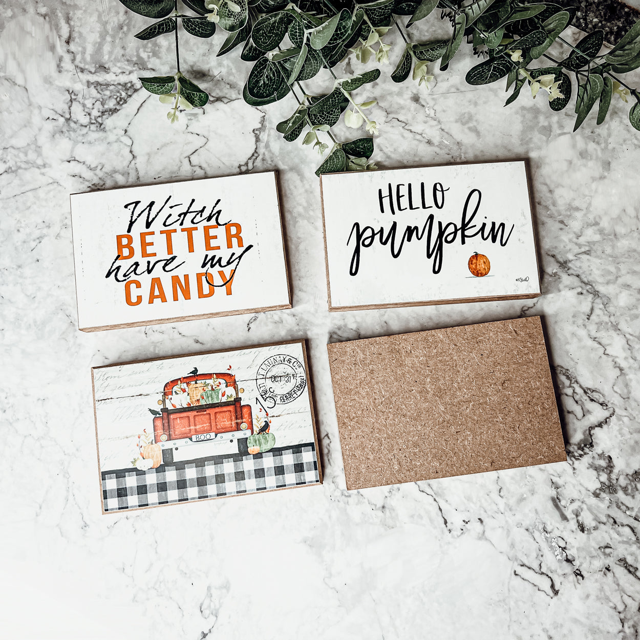A rustic wooden sign reading 'Witch Better Have My Candy' in black and orange lettering, perfect for Halloween decor.