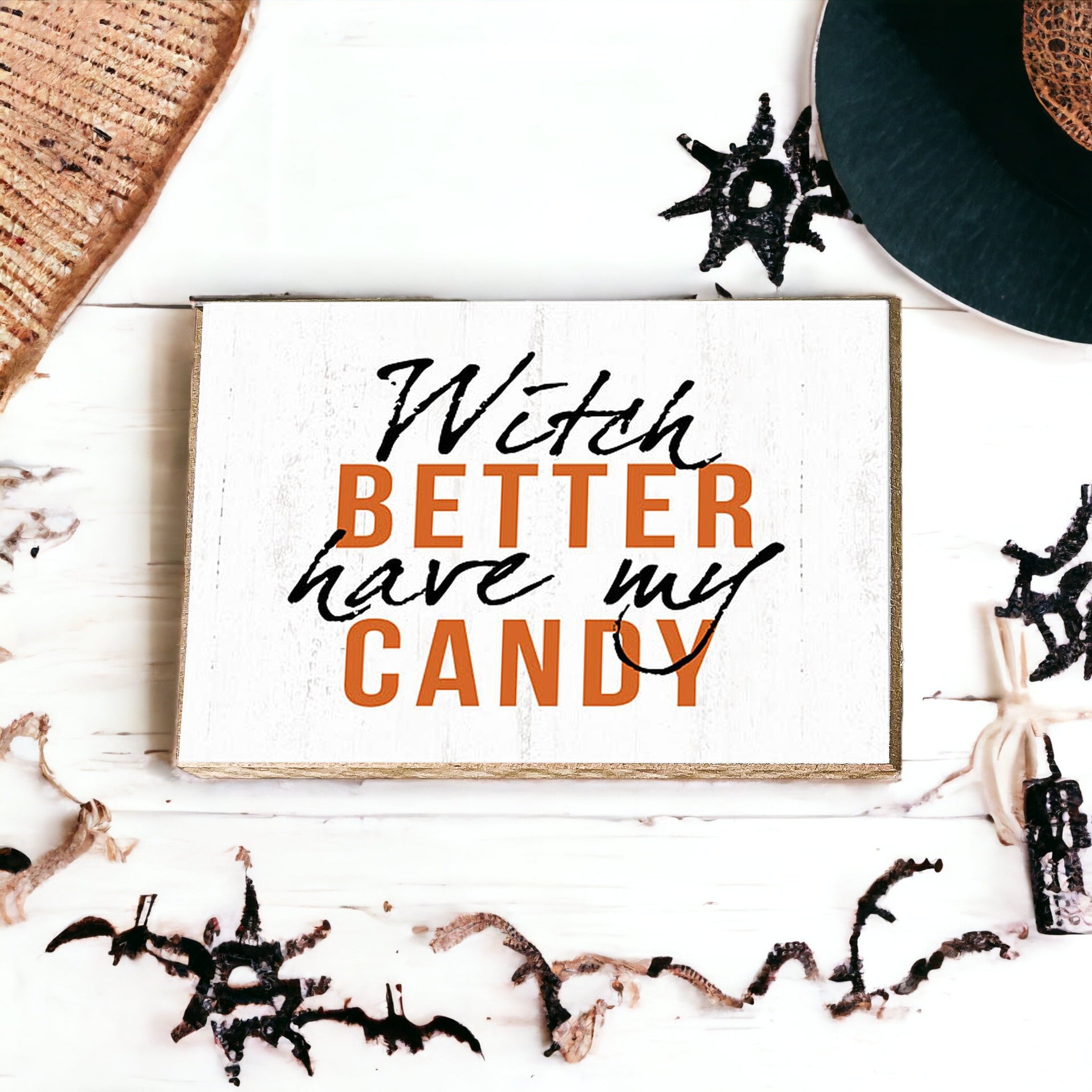 A rustic wooden sign reading 'Witch Better Have My Candy' in black and orange lettering, perfect for Halloween decor.
