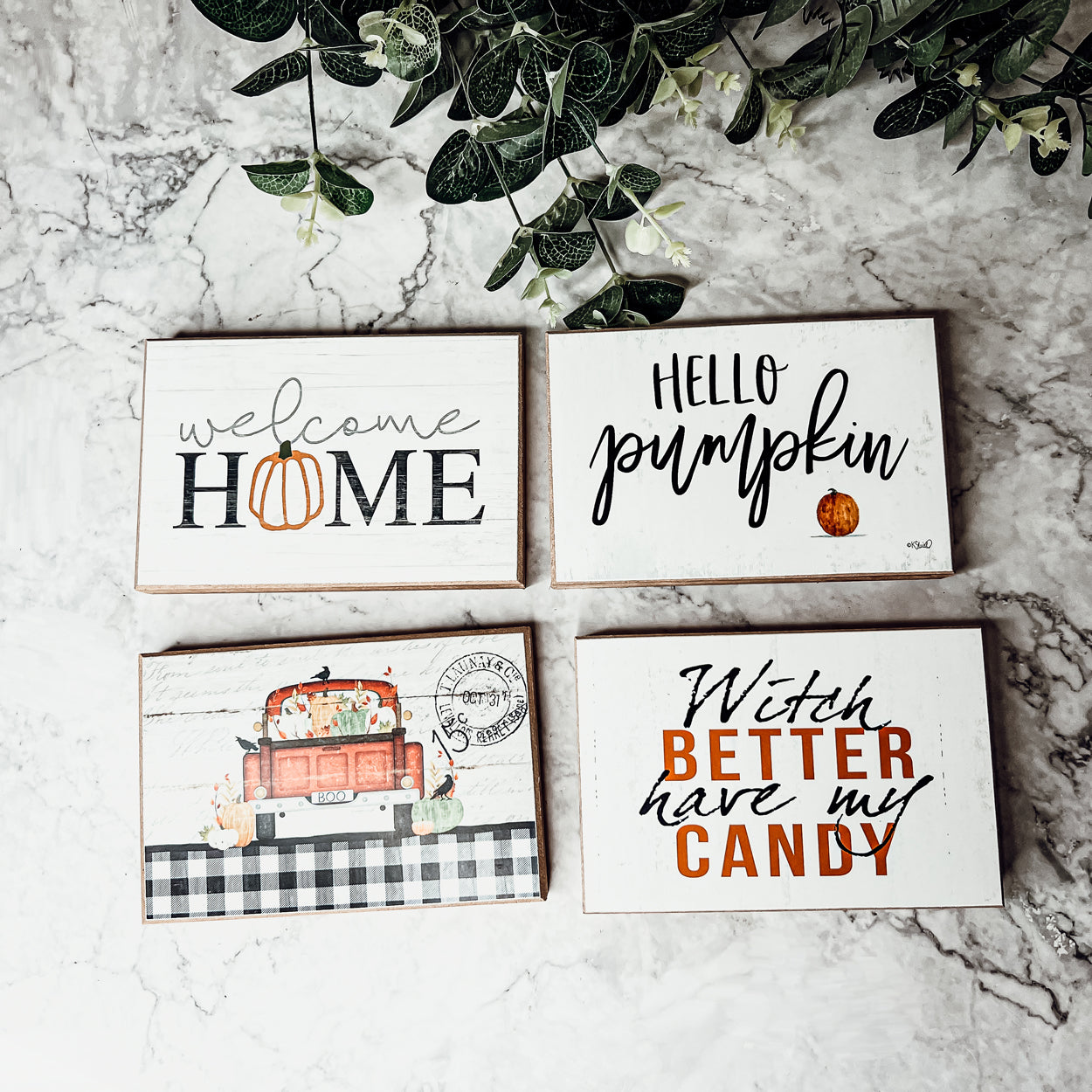 A rustic wooden sign reading 'Witch Better Have My Candy' in black and orange lettering, perfect for Halloween decor.
