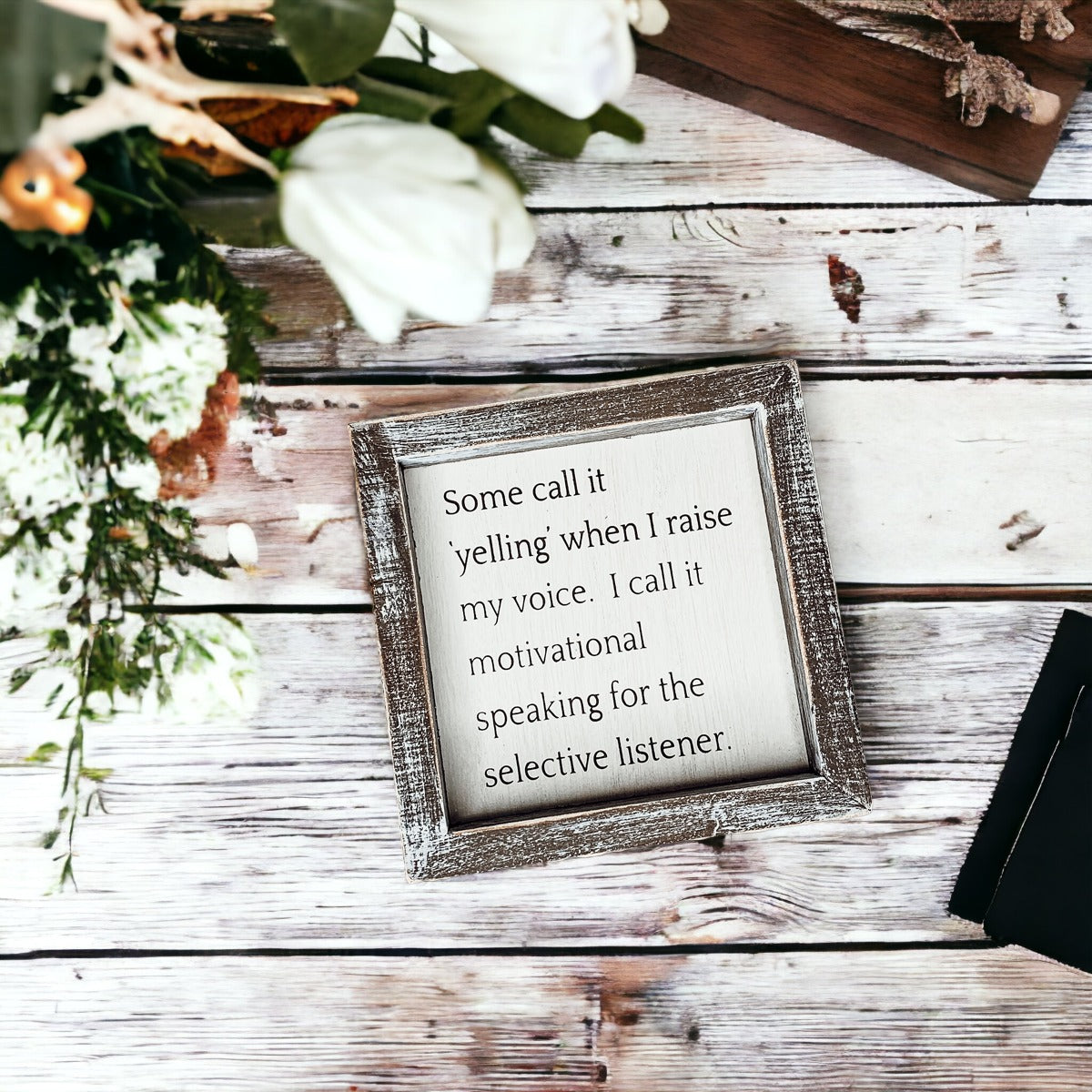 A wooden sign framed in a stylish design, featuring the quote about motivational speaking for selective listeners, measuring 6x6x1.5 inches.