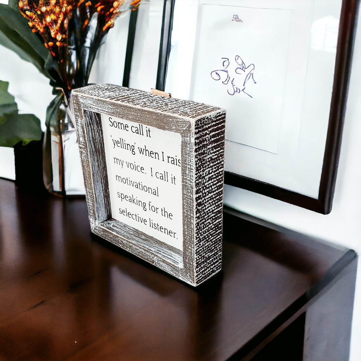 A wooden sign framed in a stylish design, featuring the quote about motivational speaking for selective listeners, measuring 6x6x1.5 inches.
