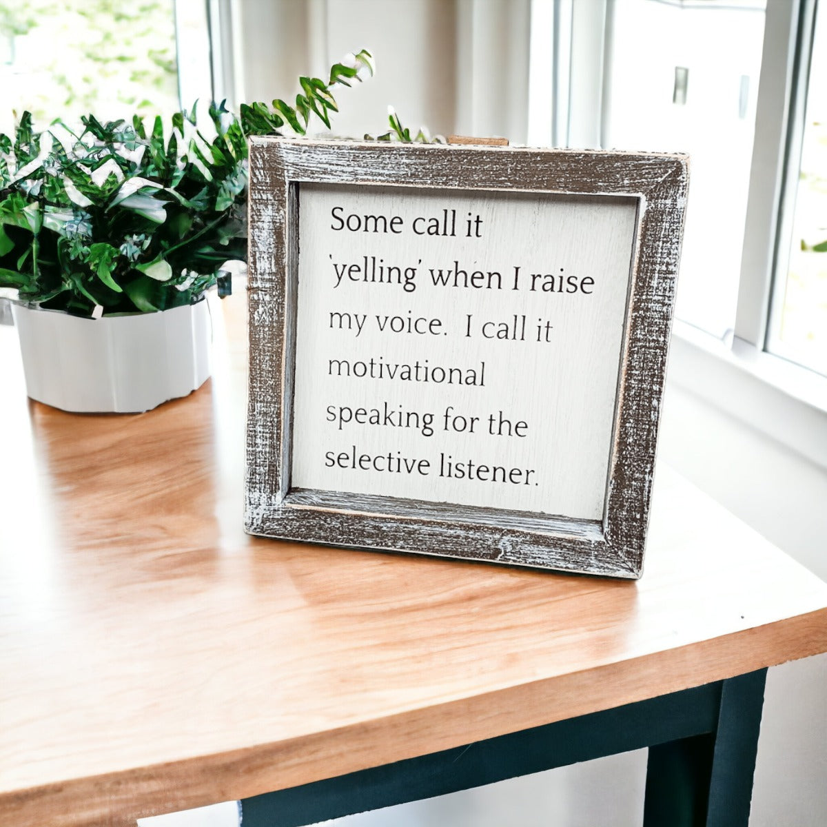 A wooden sign framed in a stylish design, featuring the quote about motivational speaking for selective listeners, measuring 6x6x1.5 inches.