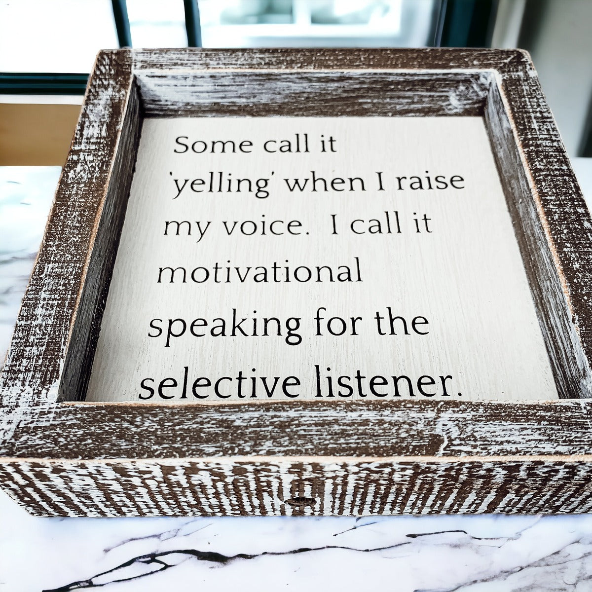 A wooden sign framed in a stylish design, featuring the quote about motivational speaking for selective listeners, measuring 6x6x1.5 inches.
