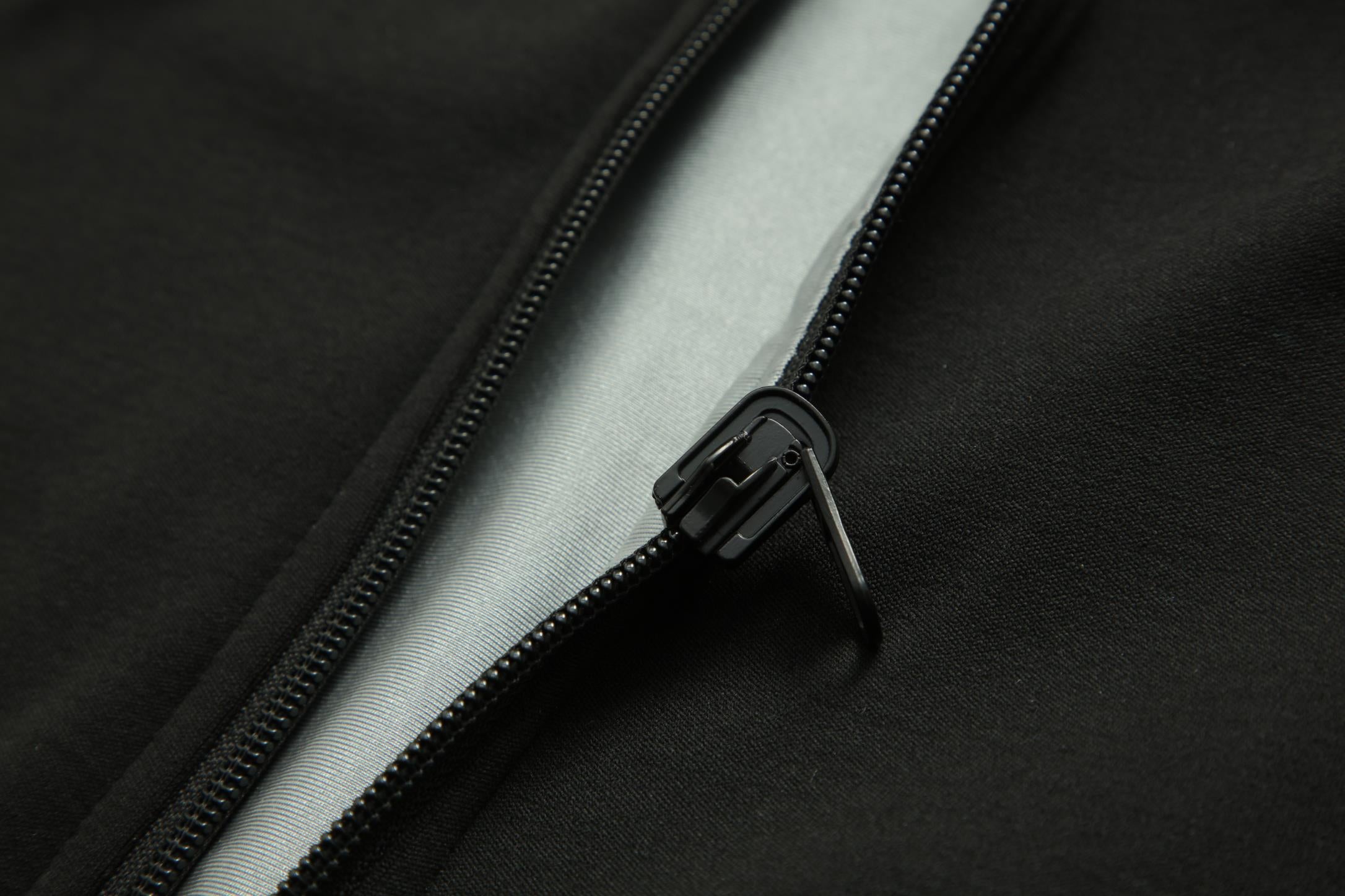 Women's CoreD Pro Reversible Jacket showcasing deep rich colors and luxurious silver embellishments, designed for style and functionality.