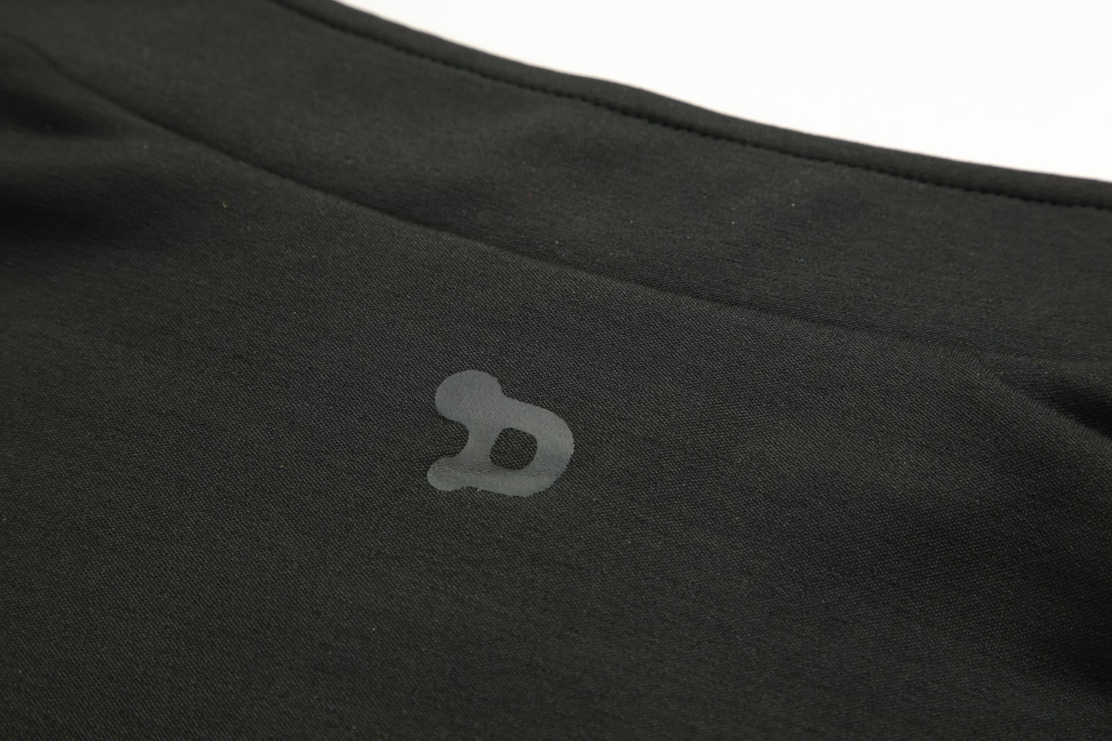 Women's CoreD Pro Reversible Jacket showcasing deep rich colors and luxurious silver embellishments, designed for style and functionality.