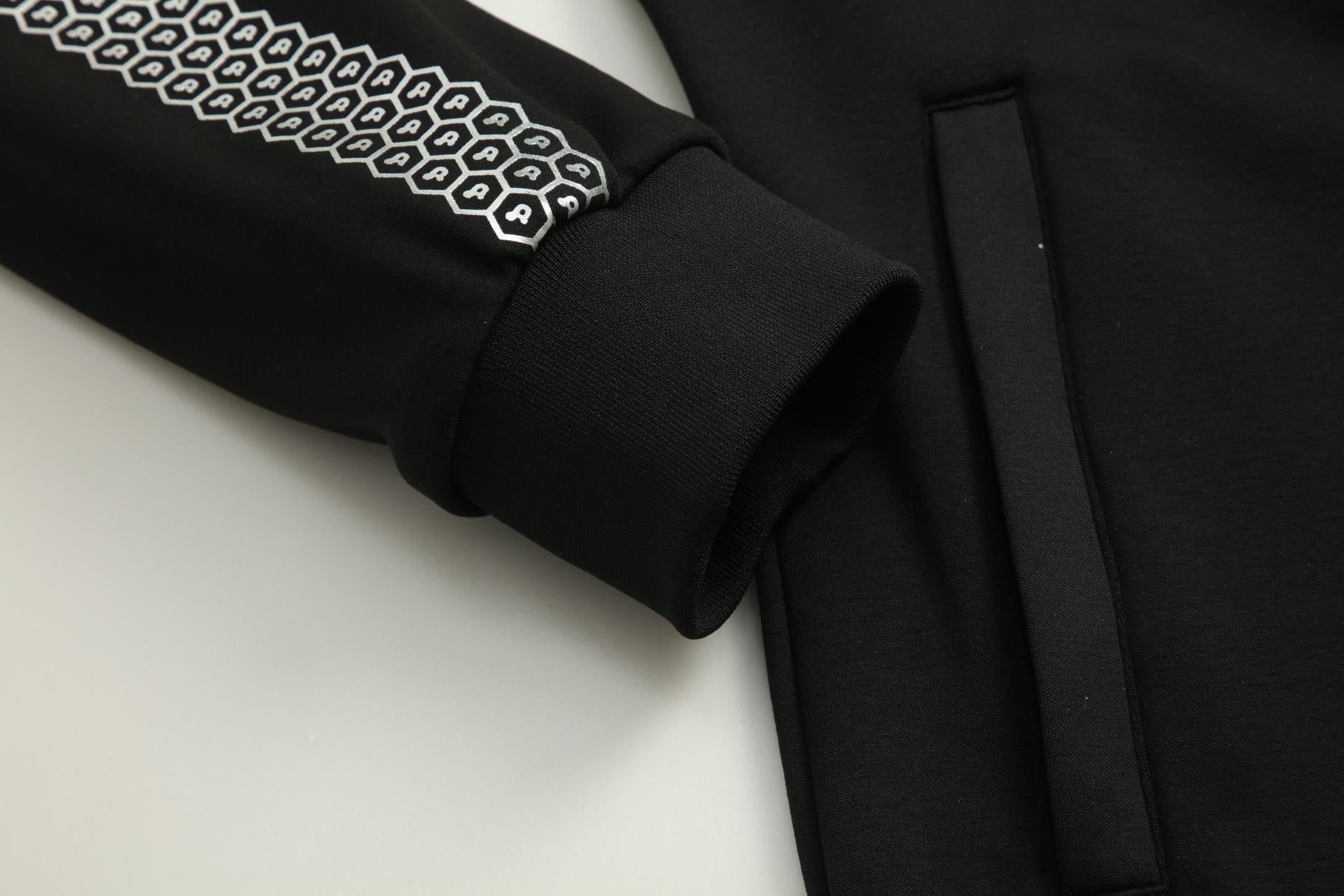 Women's CoreD Pro Reversible Jacket showcasing deep rich colors and luxurious silver embellishments, designed for style and functionality.