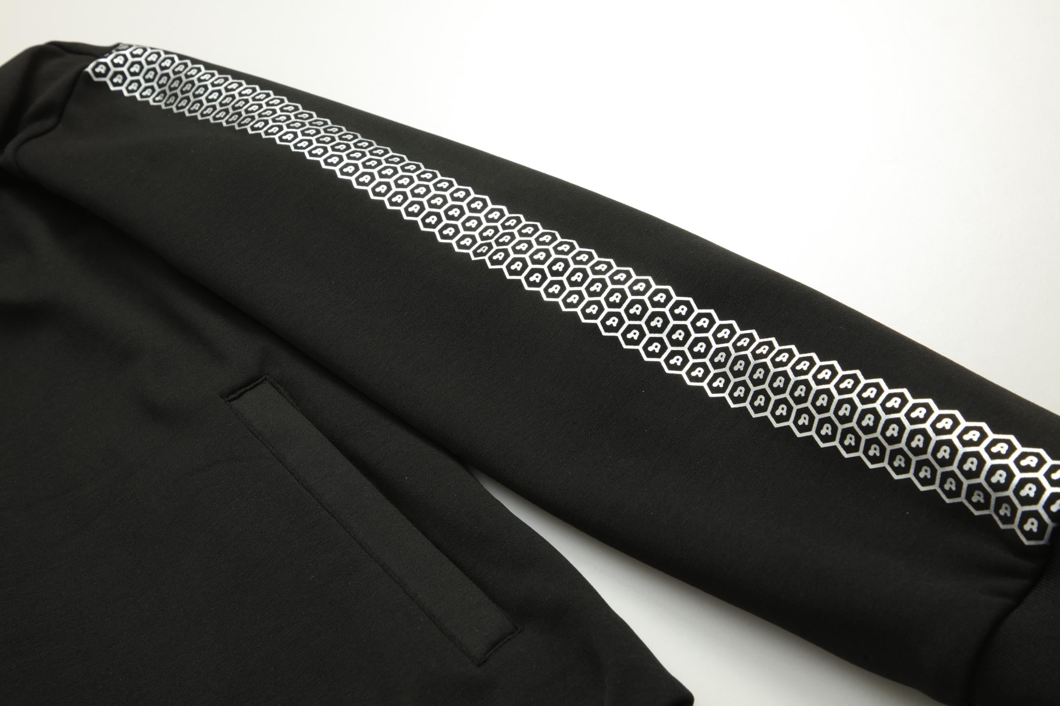 Women's CoreD Pro Reversible Jacket showcasing deep rich colors and luxurious silver embellishments, designed for style and functionality.