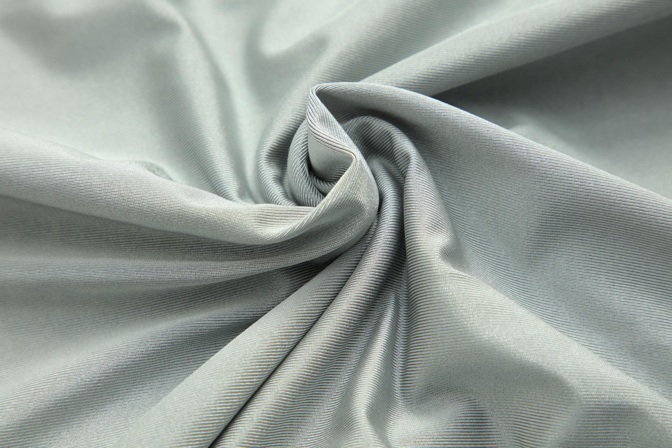 Women's CoreD Pro Reversible Jacket showcasing deep rich colors and luxurious silver embellishments, designed for style and functionality.