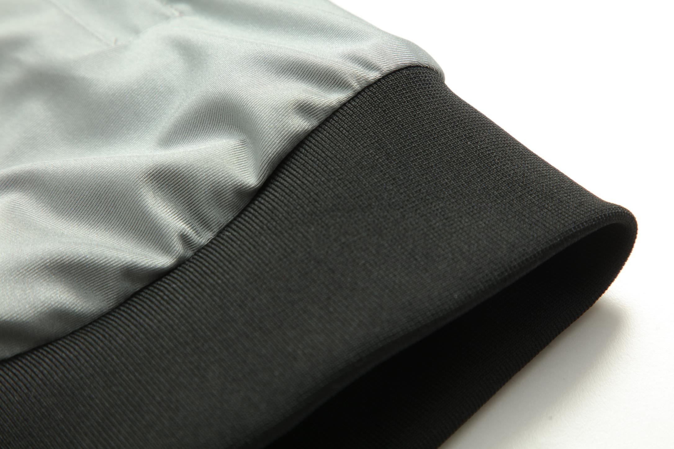 Women's CoreD Pro Reversible Jacket showcasing deep rich colors and luxurious silver embellishments, designed for style and functionality.