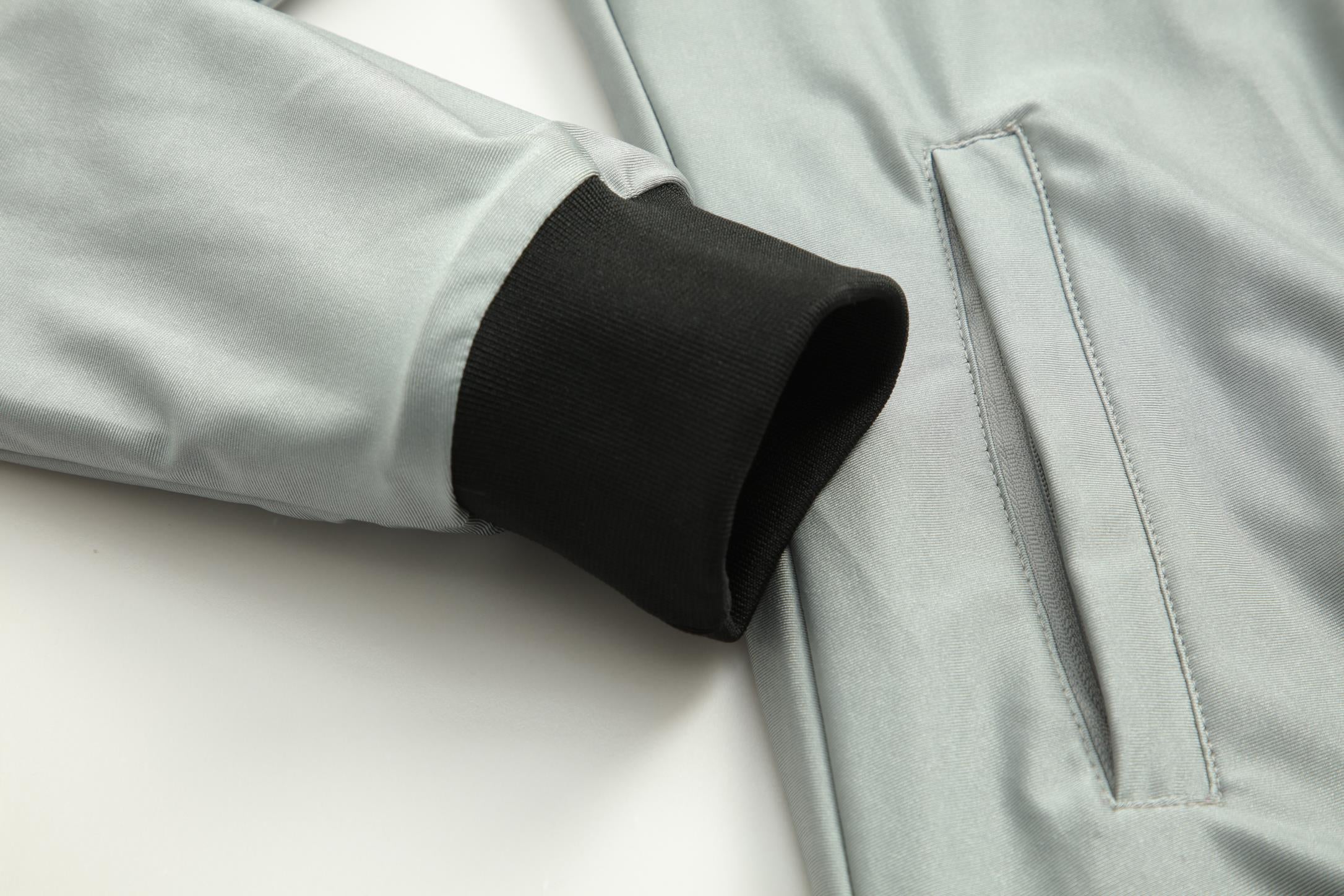 Women's CoreD Pro Reversible Jacket showcasing deep rich colors and luxurious silver embellishments, designed for style and functionality.