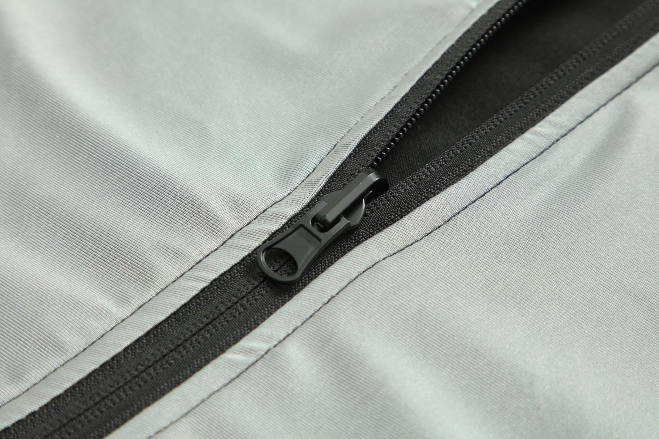 Women's CoreD Pro Reversible Jacket showcasing deep rich colors and luxurious silver embellishments, designed for style and functionality.