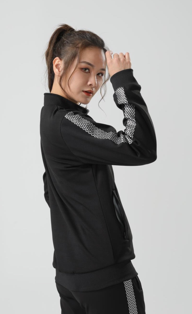 Women's CoreD Pro Reversible Jacket showcasing deep rich colors and luxurious silver embellishments, designed for style and functionality.