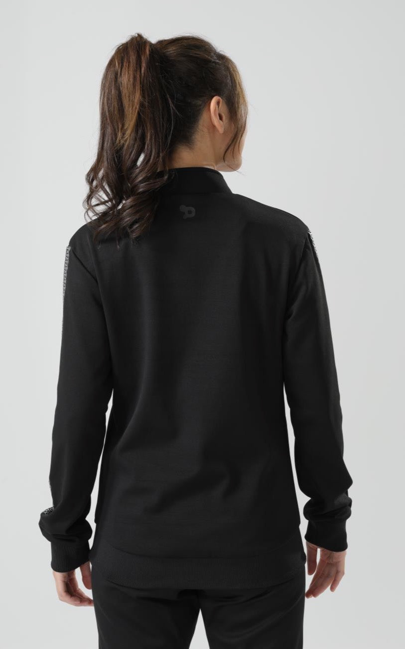 Women's CoreD Pro Reversible Jacket showcasing deep rich colors and luxurious silver embellishments, designed for style and functionality.