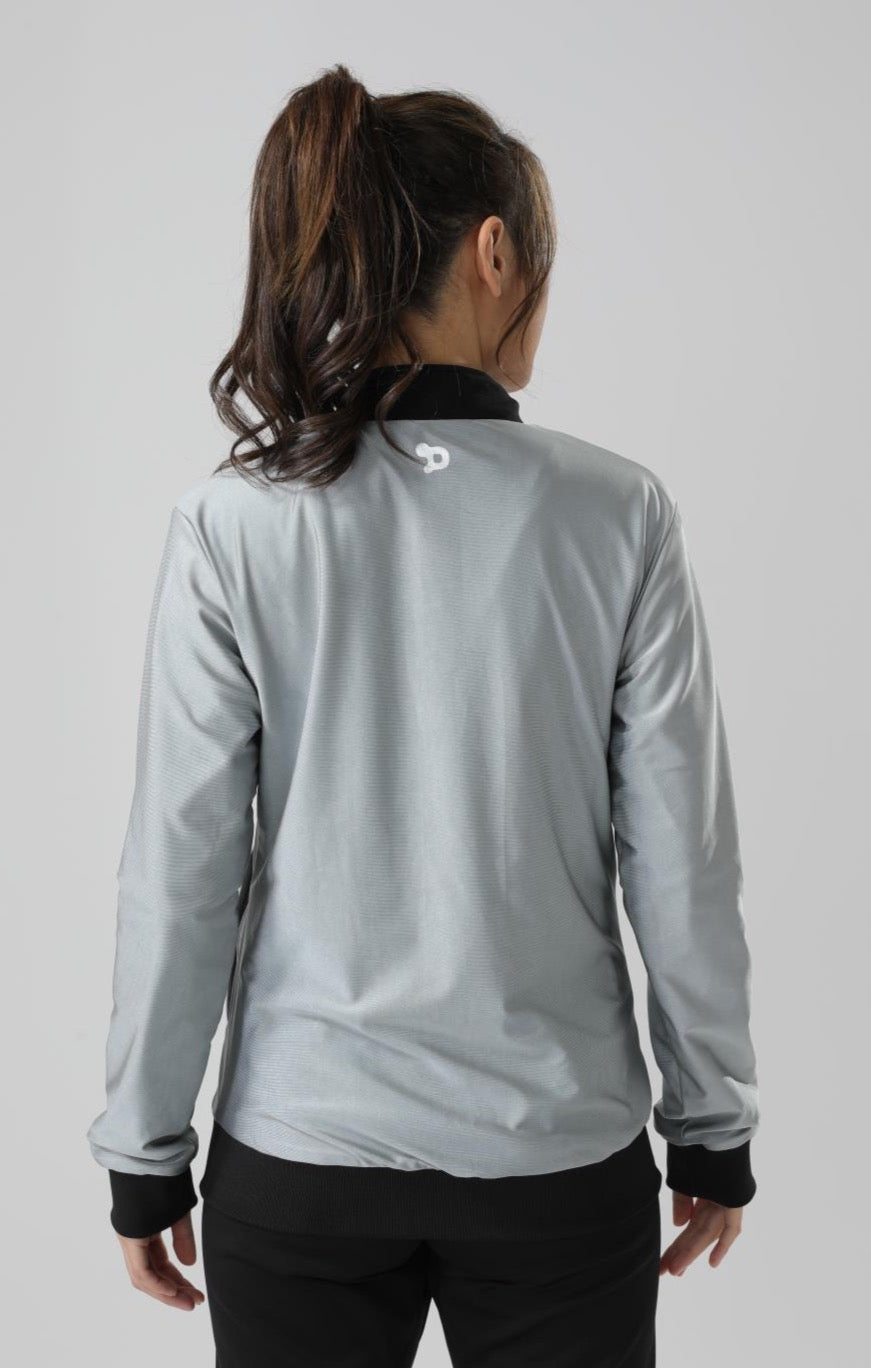 Women's CoreD Pro Reversible Jacket showcasing deep rich colors and luxurious silver embellishments, designed for style and functionality.