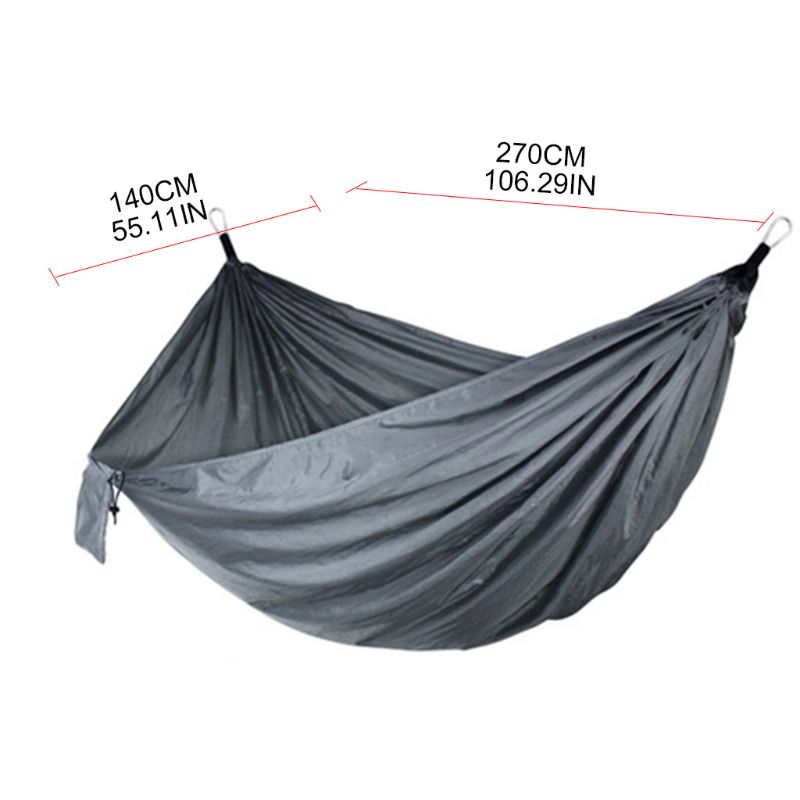 A vibrant outdoor camping hammock swing set in purple, grey, and blue, showcasing its foldable design and included accessories.