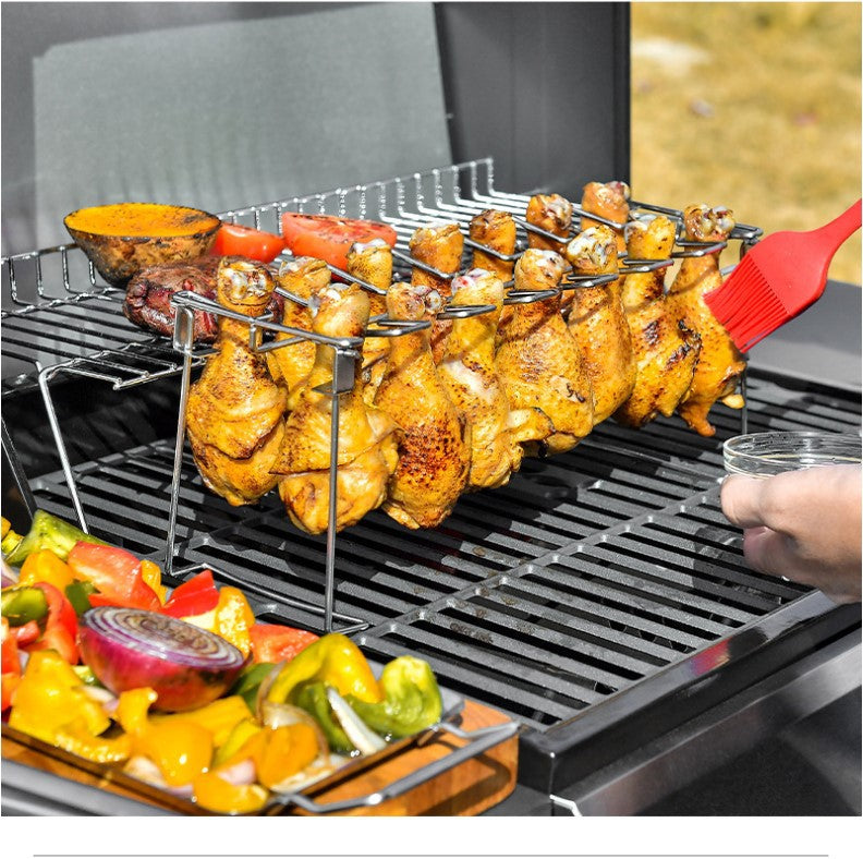 Portable Grilling Basket Mesh Clip with 14 slots, made of stainless steel, featuring a folding stand and drip tray for grilling chicken legs and vegetables.
