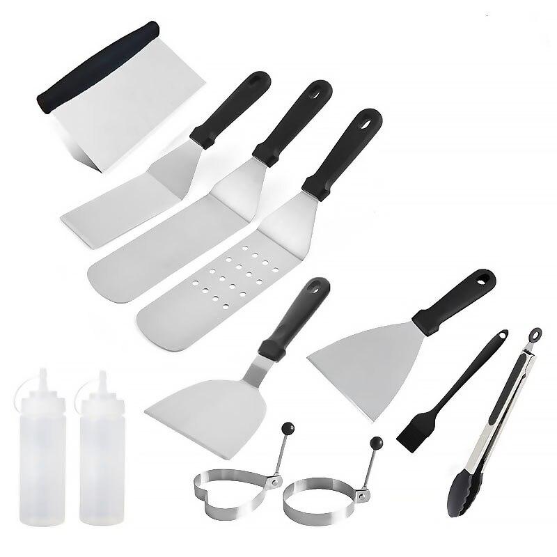 A complete 10-piece stainless steel barbecue tool set featuring a spatula, tongs, oil brush, and squeeze bottles, all with wooden handles.