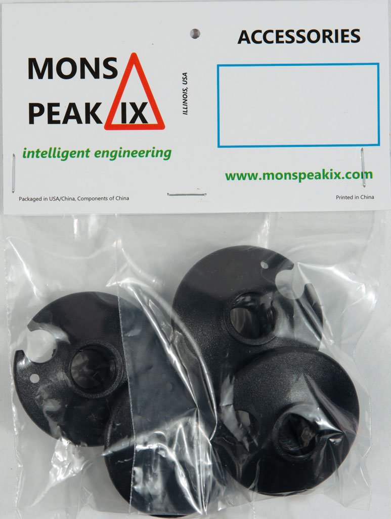 A set of four trekking pole baskets, 50 mm in diameter, designed for mud and snow with serrated edges for enhanced grip.