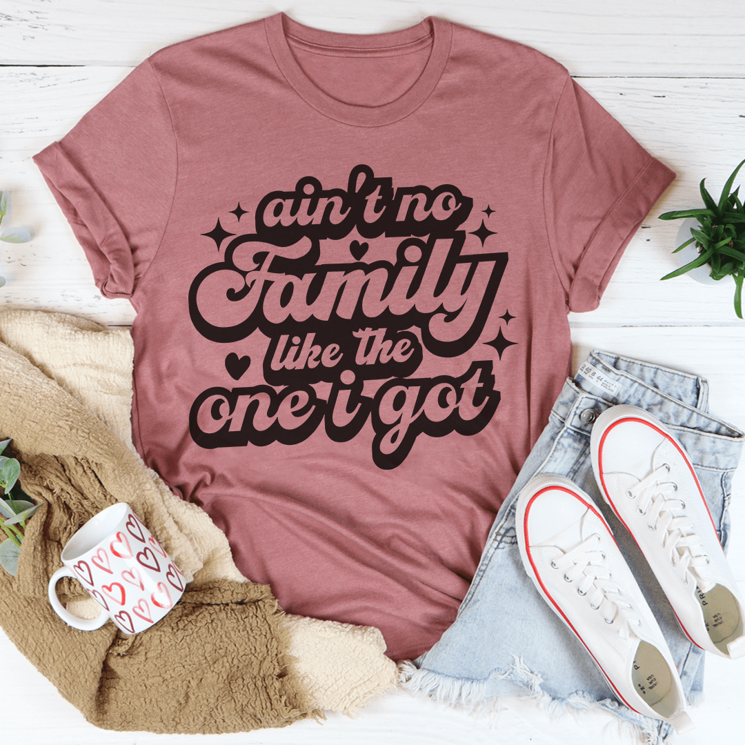 A comfortable and stylish 'Ain't No Family Like The One I Got' T-Shirt displayed on a hanger, showcasing its vibrant print and quality fabric.