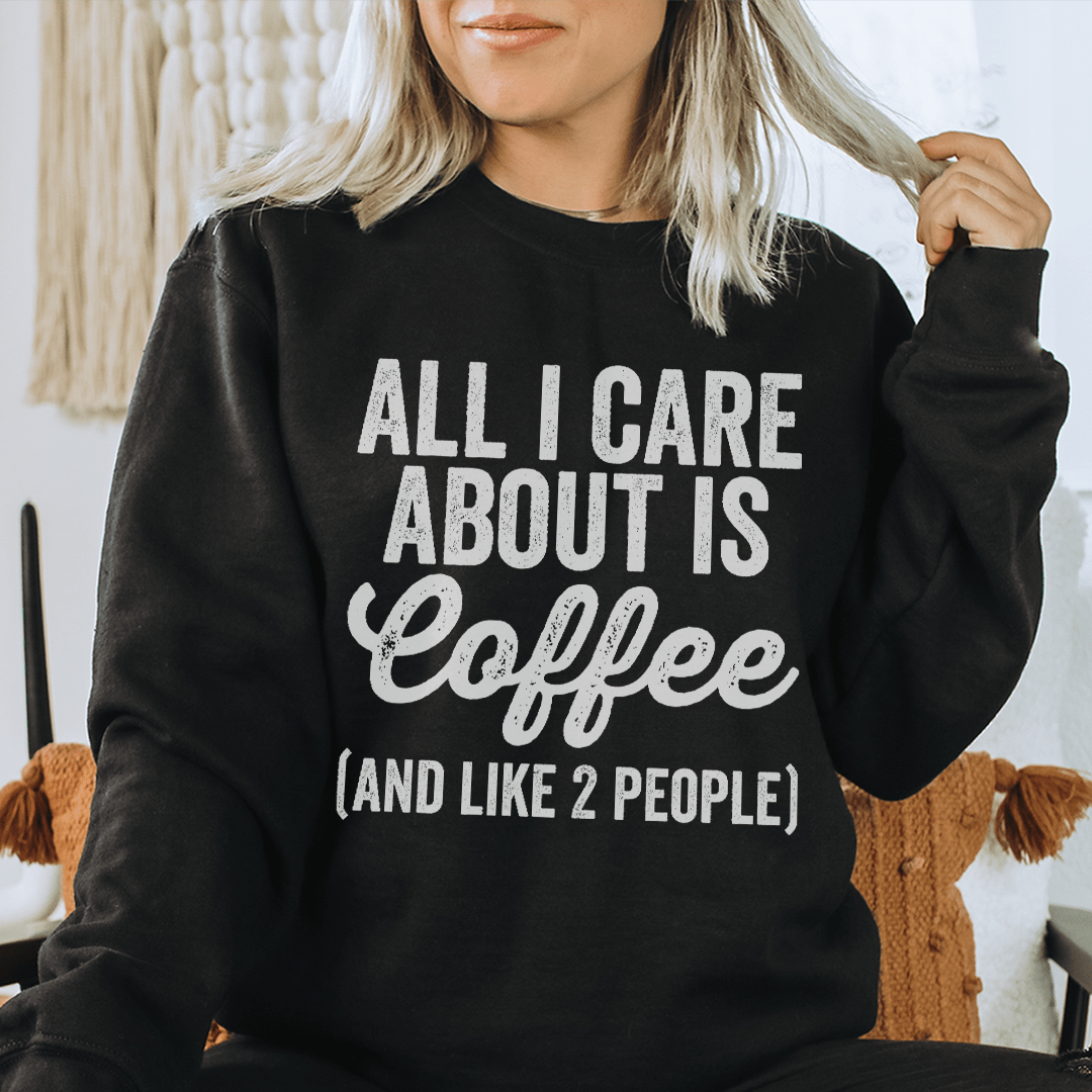 Cozy 'All I Care About Is Coffee' sweats featuring a warm fleece lining and adjustable cuffs, designed by top artists.