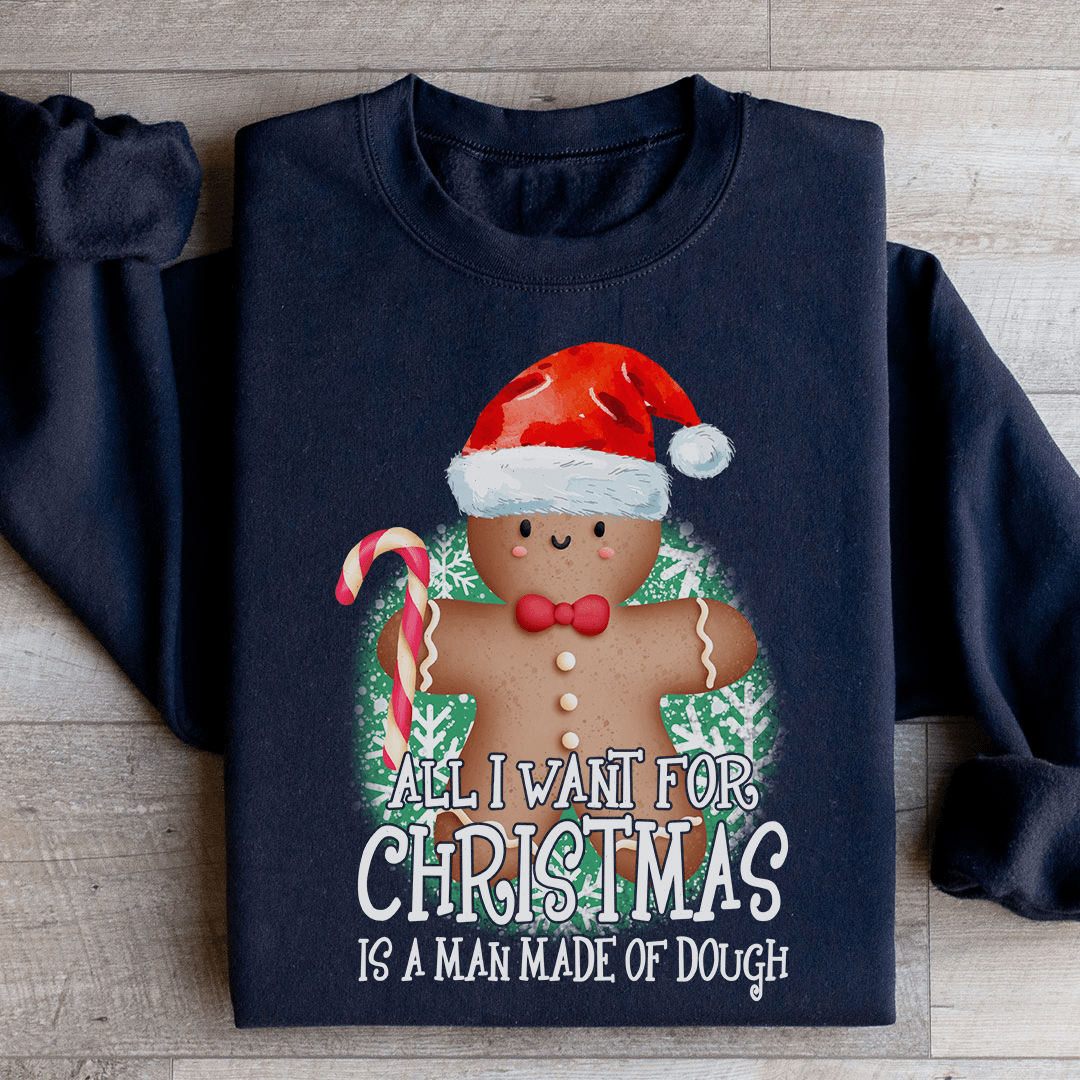 Cozy hoodie featuring a festive design with the phrase 'All I Want For Christmas Is A Man Made Of Dough', made from cotton/poly fleece blend.