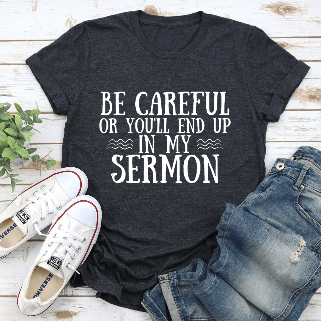 Be Careful Or You'll End Up In My Sermon T-Shirt displayed on a mannequin, showcasing its soft fabric and witty design.