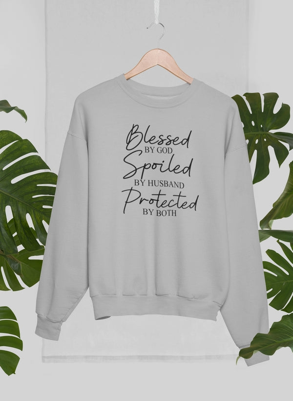 A cozy Blessed By God Spoiled By Husband Sweat Shirt featuring a stylish design, perfect for casual wear.