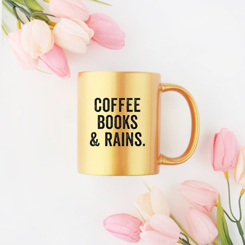 Elegant Coffee Books And Rains Gold & Silver Mug with a ceramic body and gold metallic coating, perfect for coffee and tea.